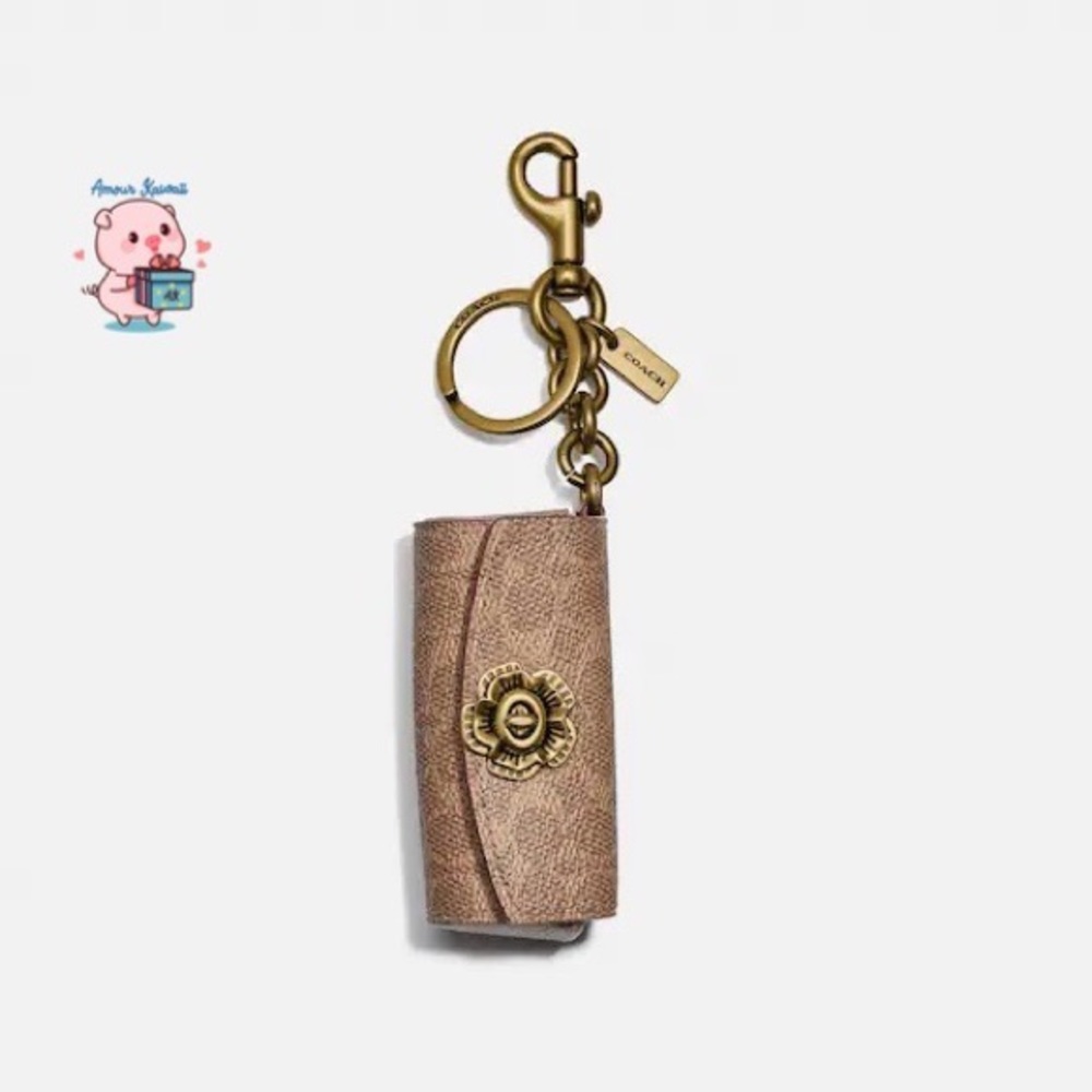 Coach Lipstick Holder In Signature Canvas tea rose turnlock